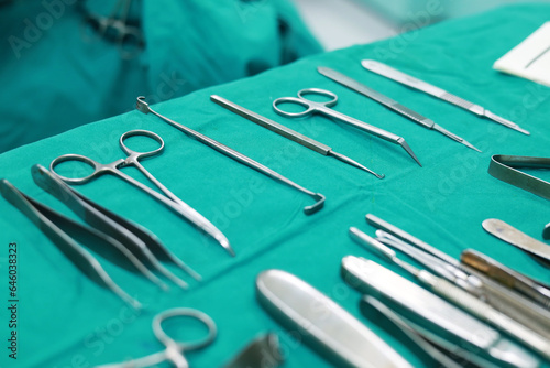 Soft focus Surgical tools and equipment on green cloth. Sterilized