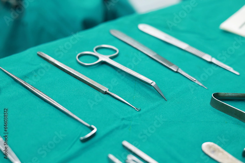 Soft focus Surgical tools and equipment on green cloth. Sterilized