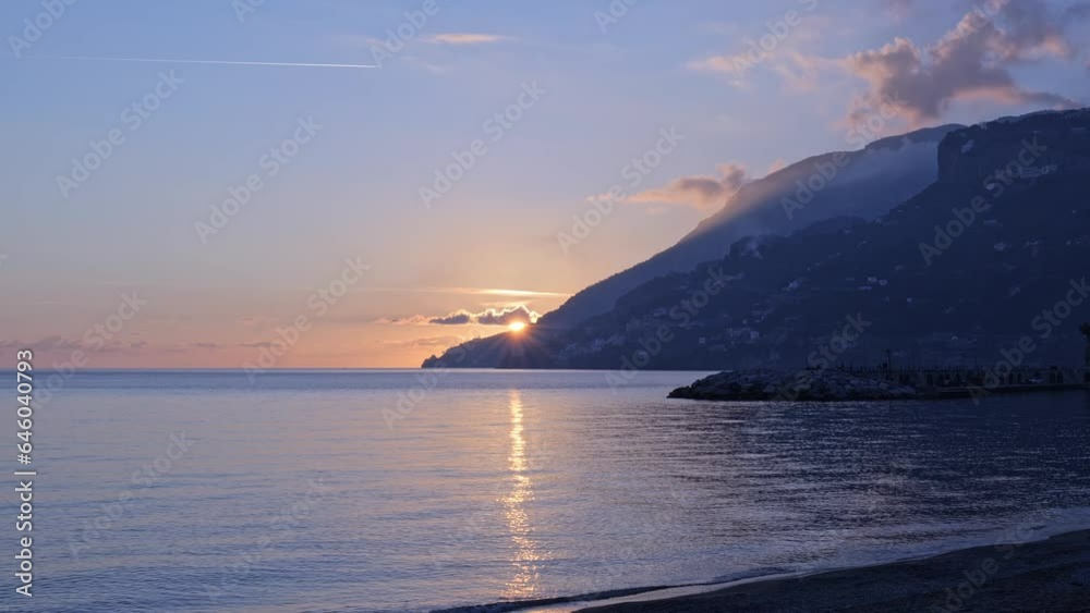 View of the Amalfi Coast from Maiori beach at sunset. Real time video with pan movement. View of the Amalfi Coast from Maiori beach at sunset. Real time video with pan movement.