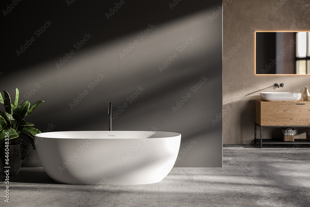 minimalist bathroom interior, concrete floor and gray and beige walls, bathroom cabinet, bathtub. minimalist bathroom interior, concrete floor and gray and beige walls, bathroom cabinet, bathtub.