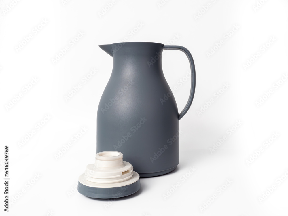 Plastic thermos isolated on a white background. Thermos close-up.