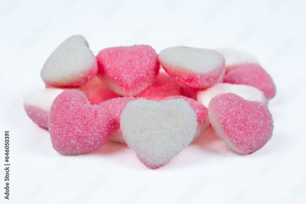 pile of heart shaped sugar Candies on white background pile of heart shaped sugar Candies on white background
