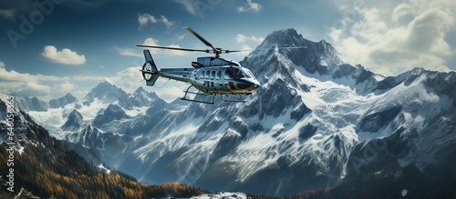 Fotografiet Helicopter in the mountains.