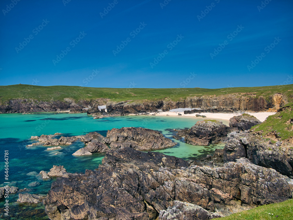 The rocky, rugged, Atlantic coast of the Isle of Lewis in the Outer Hebrides, Scotland, UK. Taken on a sunny day in summer.