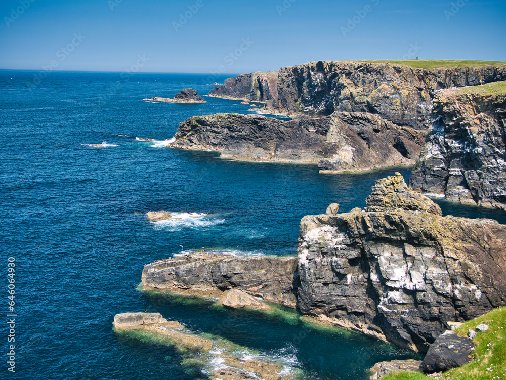 The rocky, rugged, Atlantic coast of the Isle of Lewis in the Outer Hebrides, Scotland, UK. Taken on a sunny day in summer.
