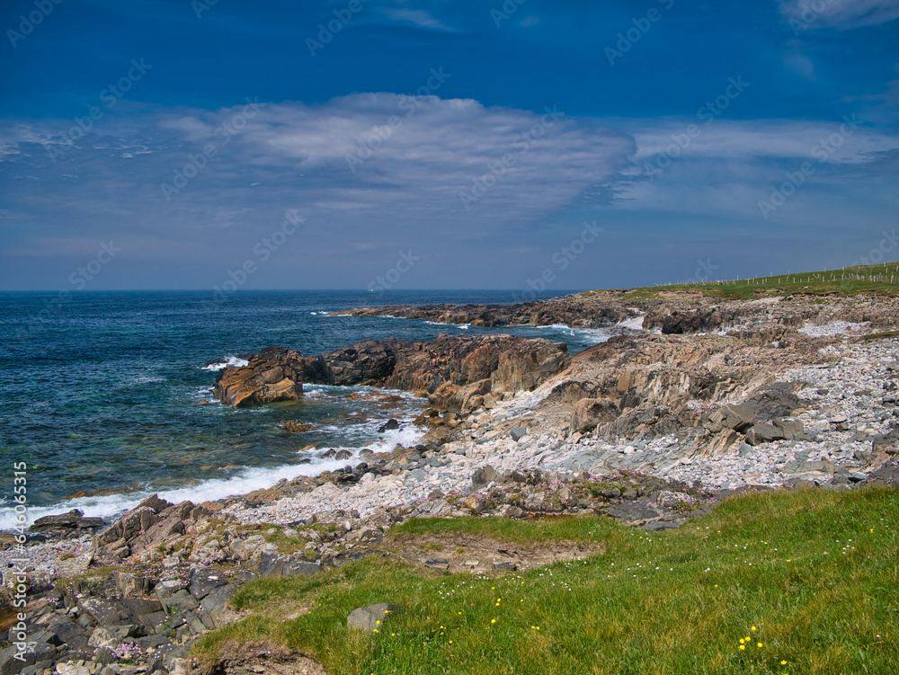 The rocky, rugged, Atlantic coast of the Isle of Lewis in the Outer Hebrides, Scotland, UK. Taken on a sunny day in summer.