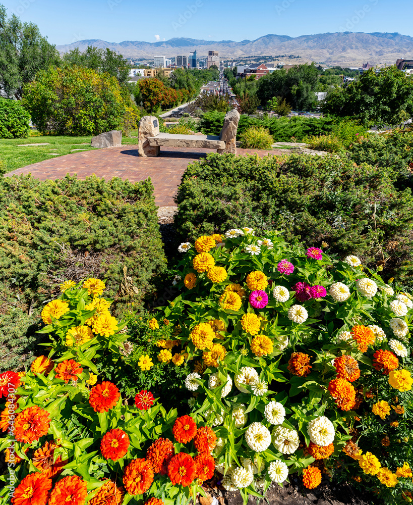 City park with colorful flowers and Boise skyline