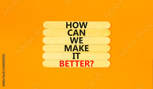 We make it better symbol. Concept words How can we make it better on wooden stick. Beautiful orange table orange background. Business we make it better concept. Copy space.
