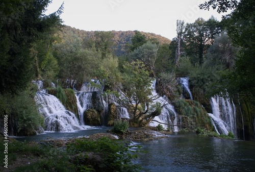 Wonderful landscapes in Bosnia and Herzegovina. Una national park. Beautiful scenery of Martin Brod waterfalls in the Una river. Sunny summer day. Selective focus.