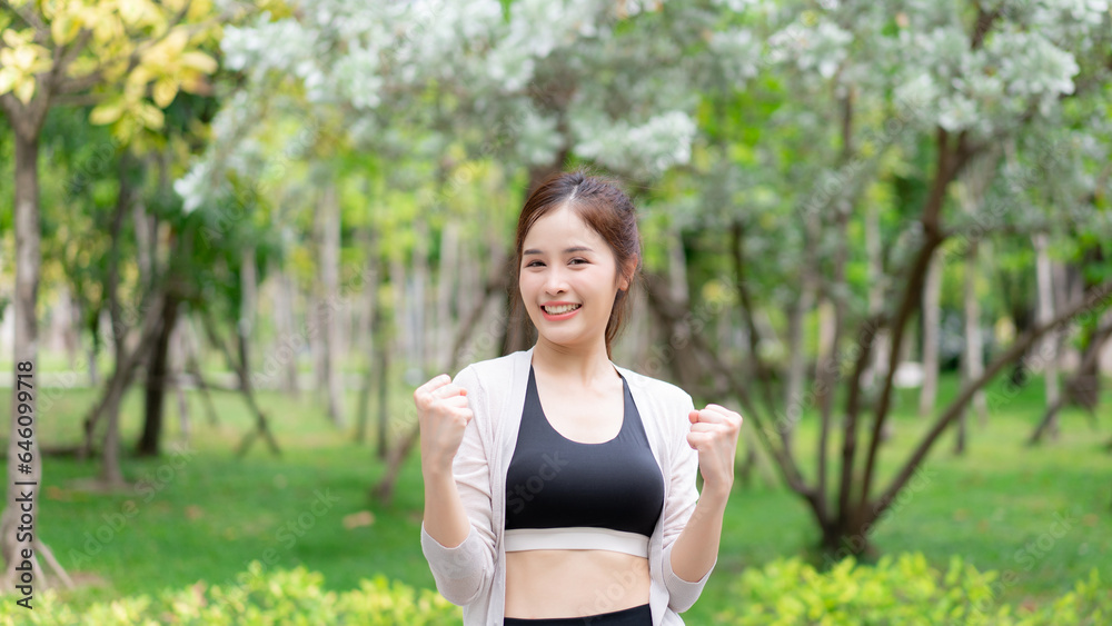 Young woman exercising and stretching in the park. Female Jogging and Doing Fitness Exercises in the City Park. Young woman exercising and stretching in the park. Female Jogging and Doing Fitness Exercises in the City Park.