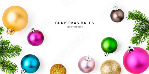 Colorful christmas balls and fir tree branch isolated on white background.