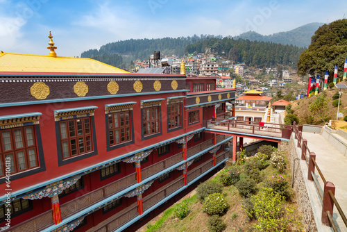 Kagyu Thekchen Ling Monastery, popularly known as the Lava Monastery, with view of cityscape on the mountain slopes at Kalimpong, West Bengal, India.  photo