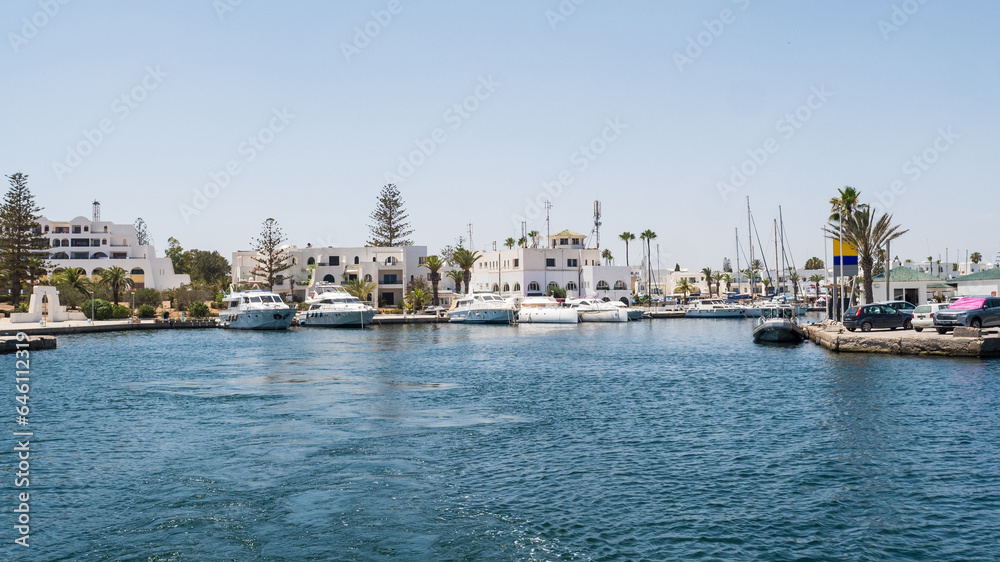 Marina with yachts near luxury hotels in the mediterranean, outdoor lifestyle.