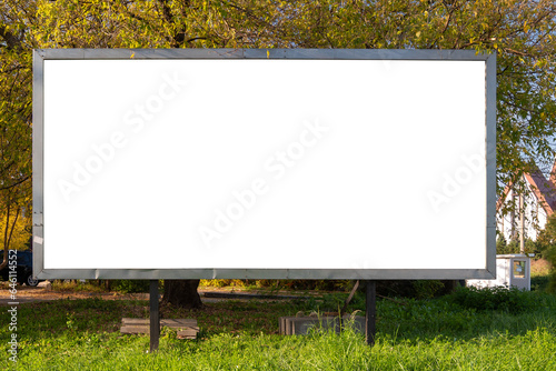 Blank white advertising billboard in the city