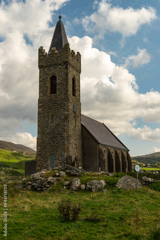 Picturesque St. Columba's Church in Glencolumbkille under a dramatic sky, County Donegal, Ireland
