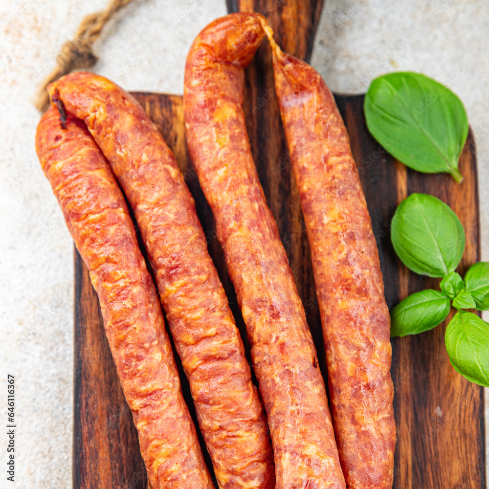 smoked sausage meat pork, beef, fresh appetizer meal food snack on the table copy space food background rustic top view smoked sausage meat pork, beef, fresh appetizer meal food snack on the table copy space food background rustic top view