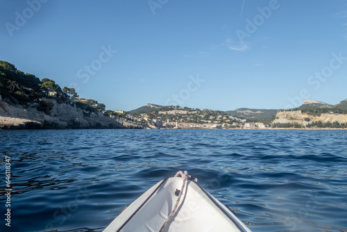 Kayaking to the Calanques fjords on the Mediterranean sea near Cassis in summer © gdefilip