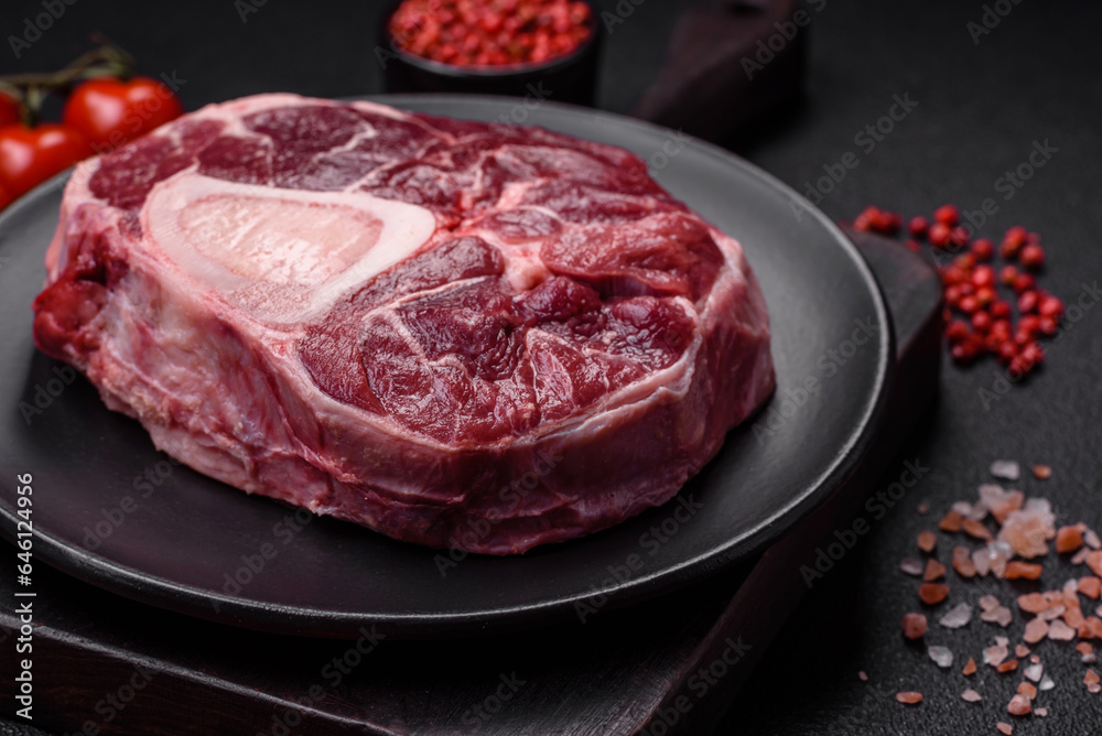 Fresh beef ossobuco steak with salt, spices and herbs Fresh beef ossobuco steak with salt, spices and herbs
