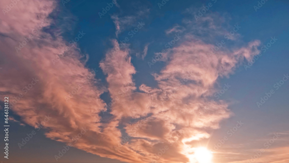 Fototapeta premium pretty sunrise gold clouds on the sky background - photo of nature