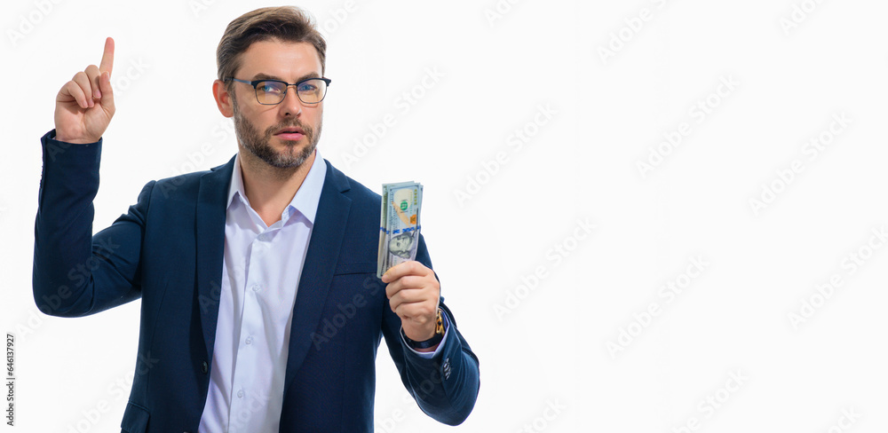 Man holding cash money in dollar banknotes on isolated white banner. Studio portrait of businessman with bunch of dollar banknotes. Dollar money concept. Career wealth business. Cash dollar banner. Man holding cash money in dollar banknotes on isolated white banner. Studio portrait of businessman with bunch of dollar banknotes. Dollar money concept. Career wealth business. Cash dollar banner.