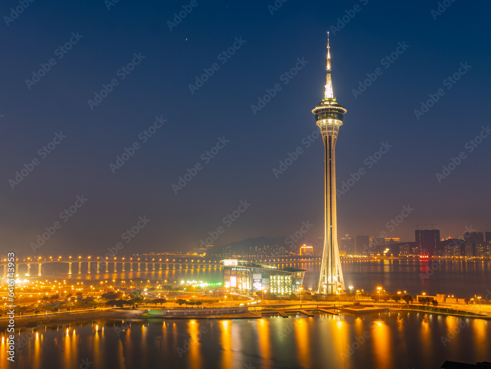 Sunset high angle view of the Macau Tower Convention and Entertainment Center and cityscape