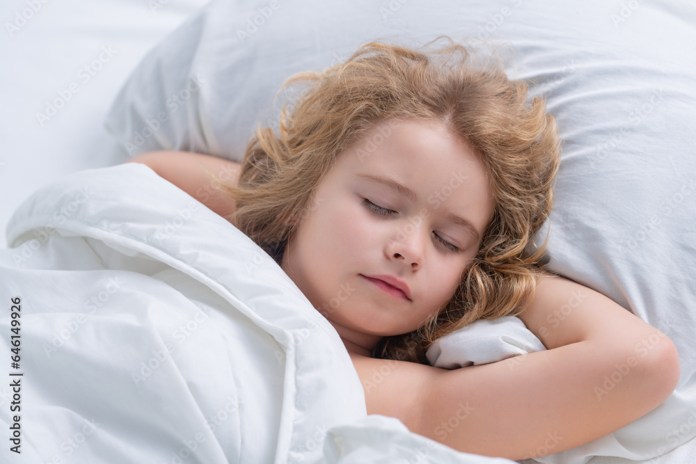 Kid enjoying sweet dreams. Kid sleeping in bed. Comfortable mattress on bedroom. Soft pillow, comfy, cozy comfortable bed concept. Healthy kids sleeping. Kid enjoying sweet dreams. Kid sleeping in bed. Comfortable mattress on bedroom. Soft pillow, comfy, cozy comfortable bed concept. Healthy kids sleeping.