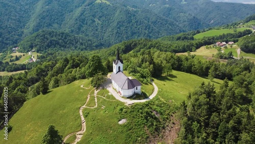 Drone Aerial View Sveti Jakob Church On Top Of Green Hills, Slovenia. photo