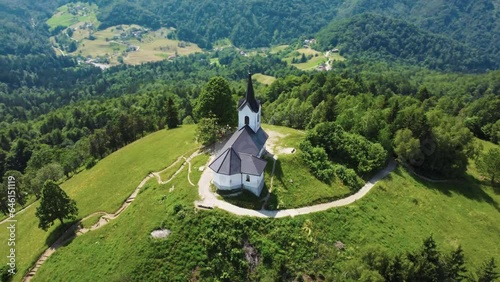 Drone Aerial View Sveti Jakob Church On Top Of Green Hills, Slovenia. photo