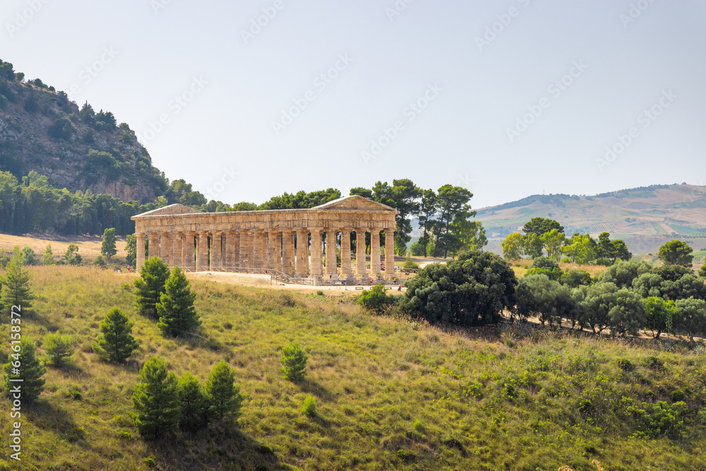 The Doric temple of Segesta with the surrounding landscape. The archaeological site at Sicily, Italy, Europe.