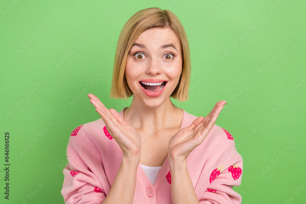 Photo of pretty young girl raise hands astonished scream dressed stylish pink strawberry print outfit isolated on green color background Photo of pretty young girl raise hands astonished scream dressed stylish pink strawberry print outfit isolated on green color background