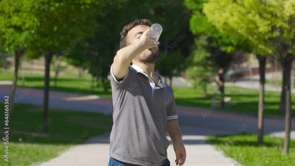 Dwarf young man drinking water. Water for healthy life. Dwarf young man drinking water. Water for healthy life.