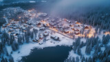 Aerial view of mountain village at night. Beautiful winter landscape.