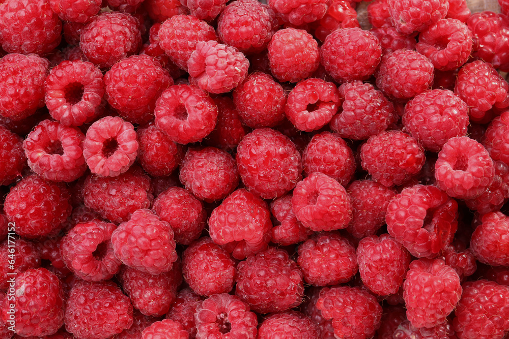 Heap of tasty ripe raspberries as background, top view Heap of tasty ripe raspberries as background, top view