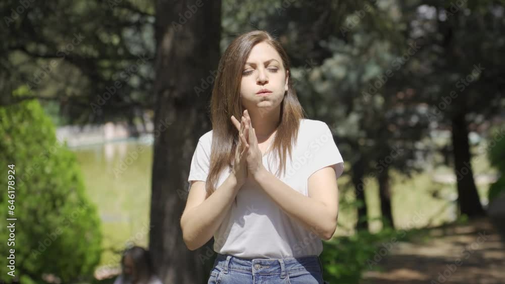 Thoughtful woman in the park. Thoughtful woman in the park.