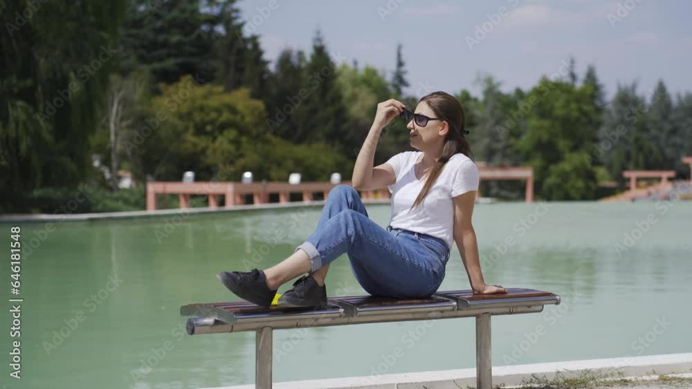 The woman is tired and resting outside. The woman is tired and resting outside.