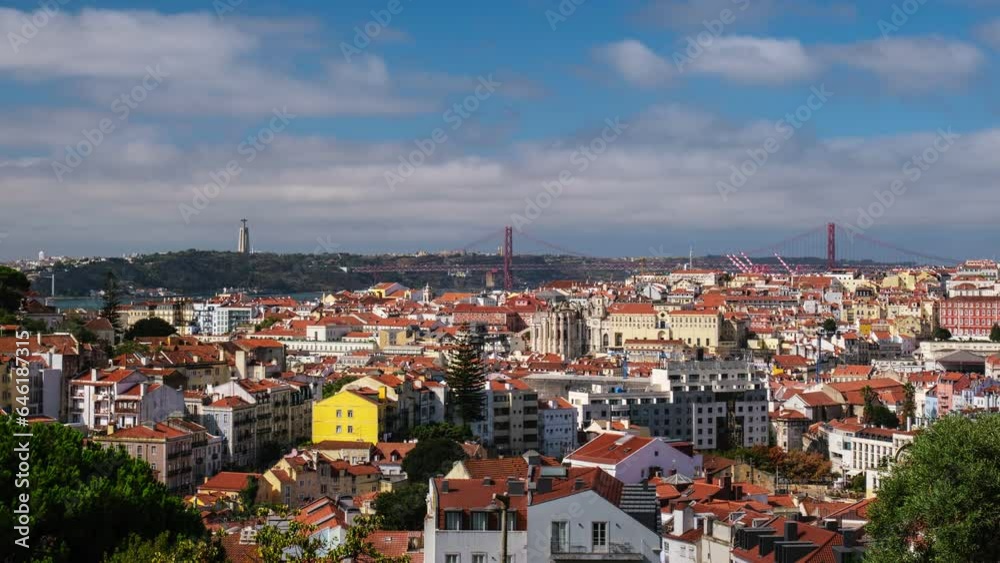 Timelapse of Lisbon famous view from Miradouro dos Barros tourist viewpoint over Alfama old city district, 25th of April Bridge and Christ the King statue. Lisbon, Portugal, Europe Timelapse of Lisbon famous view from Miradouro dos Barros tourist viewpoint over Alfama old city district, 25th of April Bridge and Christ the King statue. Lisbon, Portugal, Europe