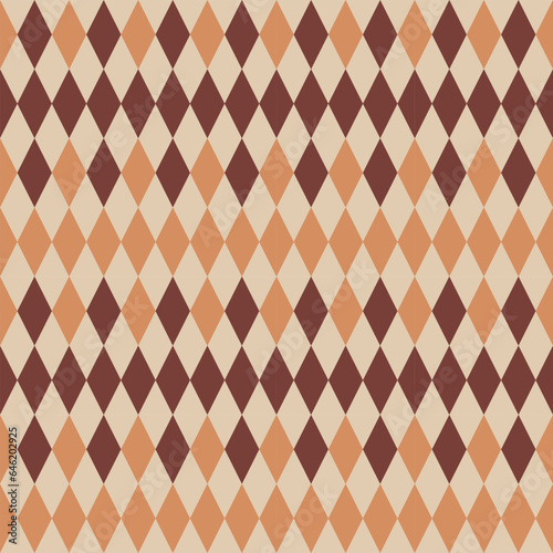 argyle seamless vector pattern in autumn colors. Traditional geometric vector argyle stitched background art for gift wrapping, socks, sweater, jumper, or trendy classic fashion