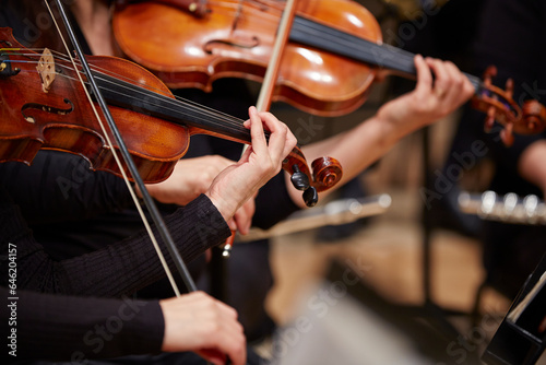 Obraz na plátne Close up of musician hands playing violin