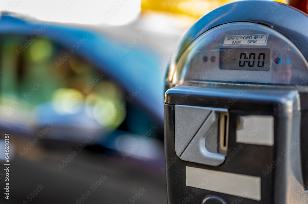 Selective focus on an expired parking meter with no time left. Selective focus on an expired parking meter with no time left.