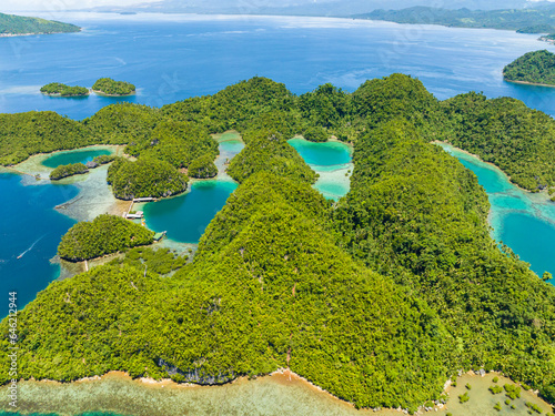 Aerial view of Tropical Island with lagoons. Turquoise water and corals. Mindanao, Philippines. Travel concept.