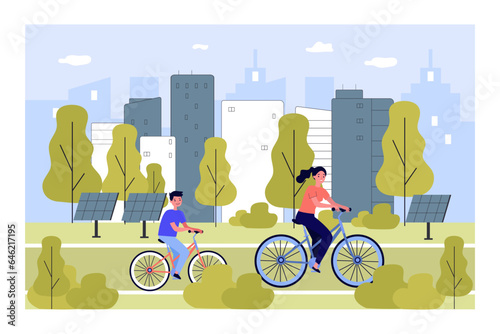 Happy mother and son cycling in park with solar panels. Landscape with green urban infrastructure, woman and boy riding eco-friendly transport vector illustration. Ecology, sustainability concept