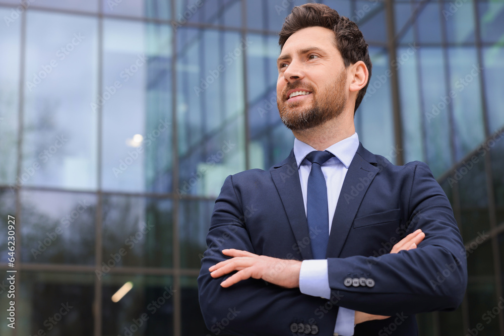 Happy real estate agent in suit outdoors. Space for text Happy real estate agent in suit outdoors. Space for text