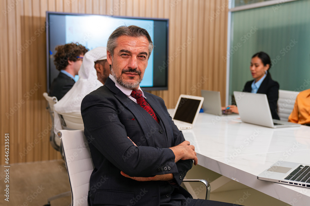 Successful business man, Smiling businesspeople having a discussion in an office Successful business man, Smiling businesspeople having a discussion in an office