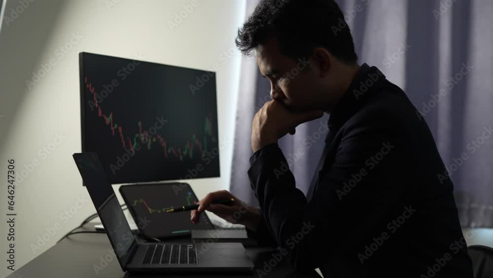 Online stock trading businessman Stock market value trading. Stock broker looking at charts, indices and figures on pc computer screen in office. Trader. Business success concept. Online stock trading businessman Stock market value trading. Stock broker looking at charts, indices and figures on pc computer screen in office. Trader. Business success concept.
