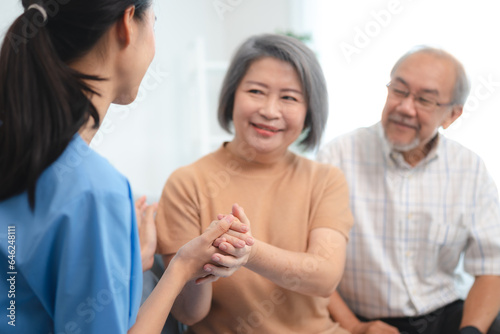 Senior Asian female and elderly male person with mental health disease care lifestyle, mature, care, old, adult retirement woman and man patient are happy at home, elder grandmother having smile © chokniti