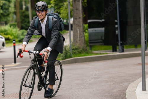 Manager commuting to the office by bike