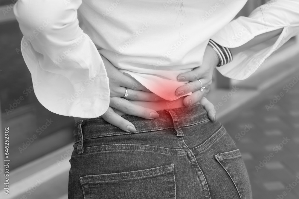 woman with back pain symptoms, office syndrome; portrait of asian woman