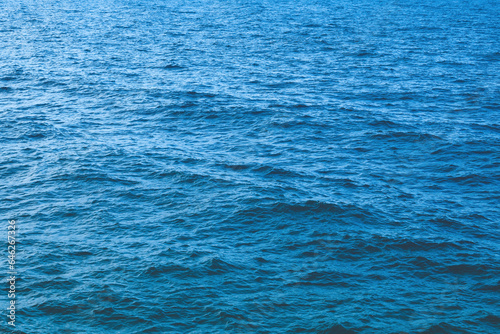 Blue ocean water surface as background