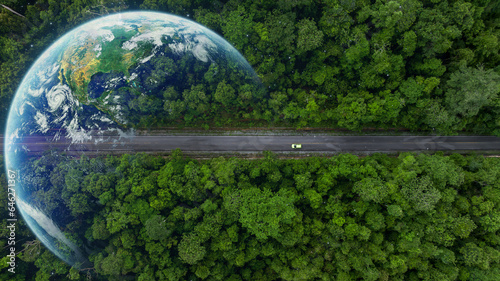 Aerial top view globe planet with electric vehicle car on asphalt road forest in tropical rainforest green forest tree, Green ev car on road tropical jungle forest, Electric car with nature.