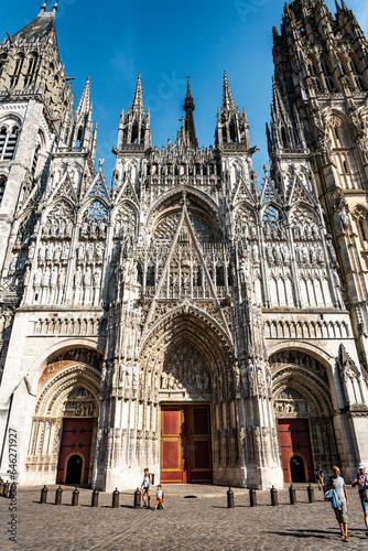 The facade of beautiful Rouen Cathedral also called Cathedral of Notre-Dame, in Gothic-style, richly decorated, Rouen city center, Normandy, France